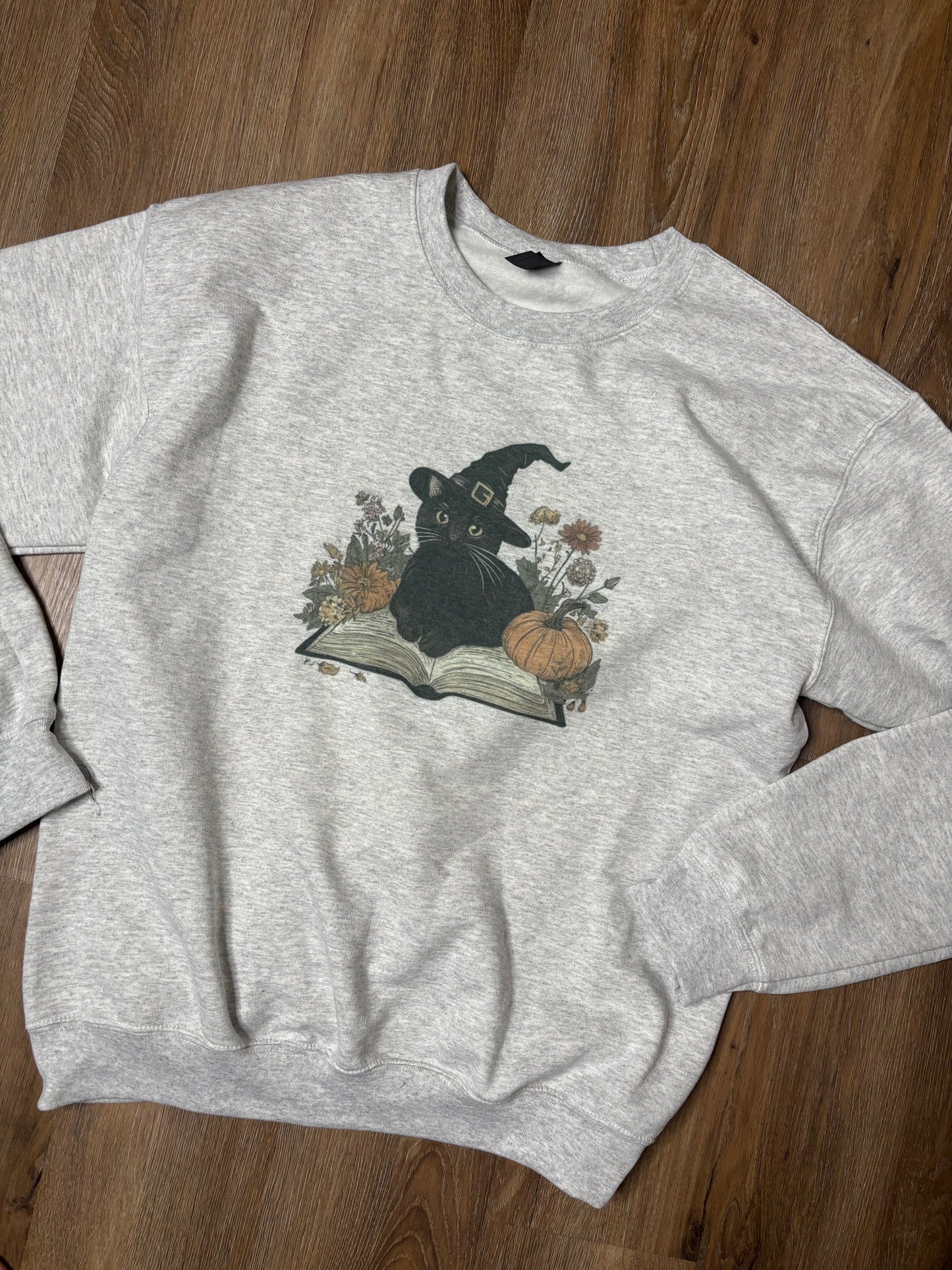 Witch Kitty Reading Crewneck